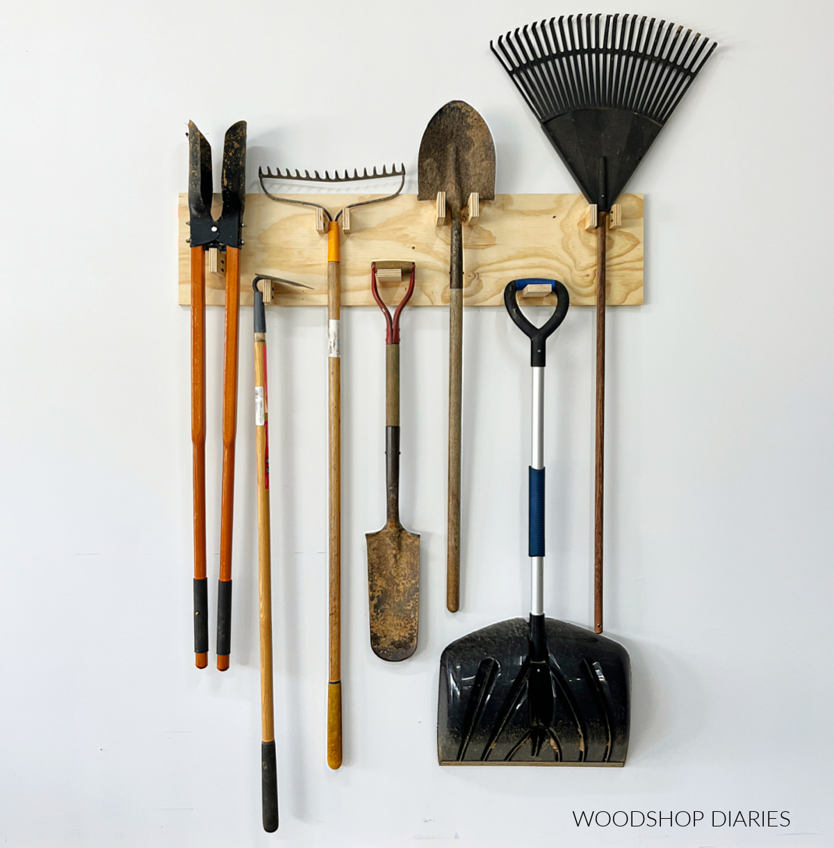 Garden tools organized on wall